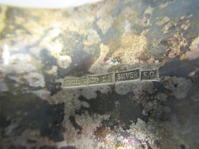 A CHINESE SILVER STIFF HINGED BANGLE Image