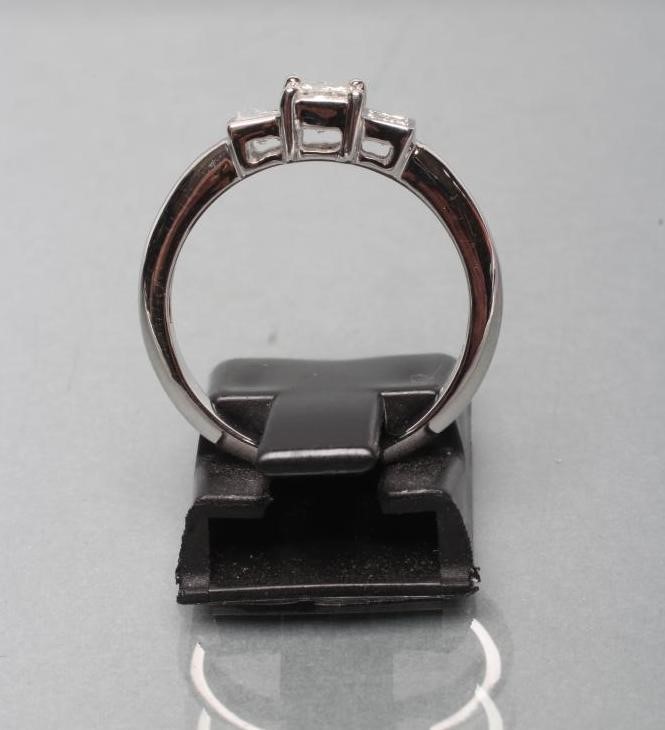 A THREE STONE DIAMOND RING Image