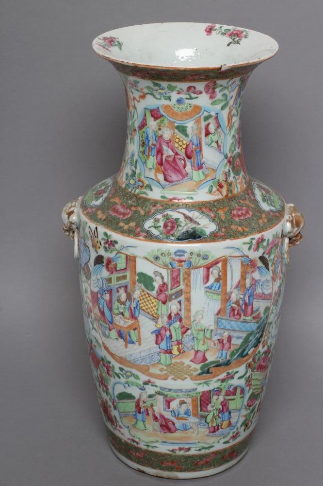 A CANTONESE PORCELAIN VASE of flared cylindrical form with sloping shoulders and two fixed lion mask Image