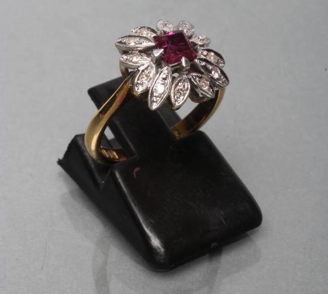 A RUBY AND DIAMOND CLUSTER RING Image