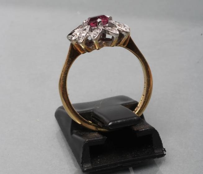 A RUBY AND DIAMOND CLUSTER RING Image