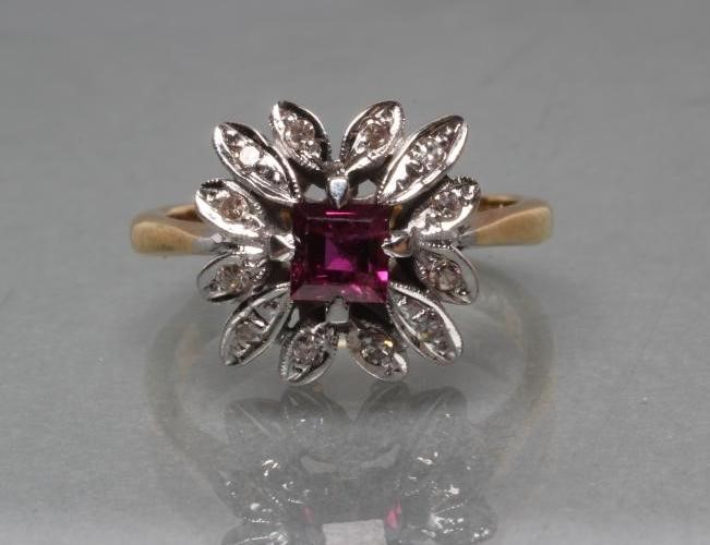A RUBY AND DIAMOND CLUSTER RING Image