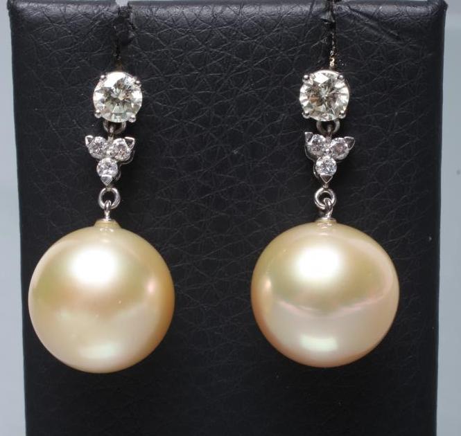 A PAIR OF PEARL DROP EARRINGS Image