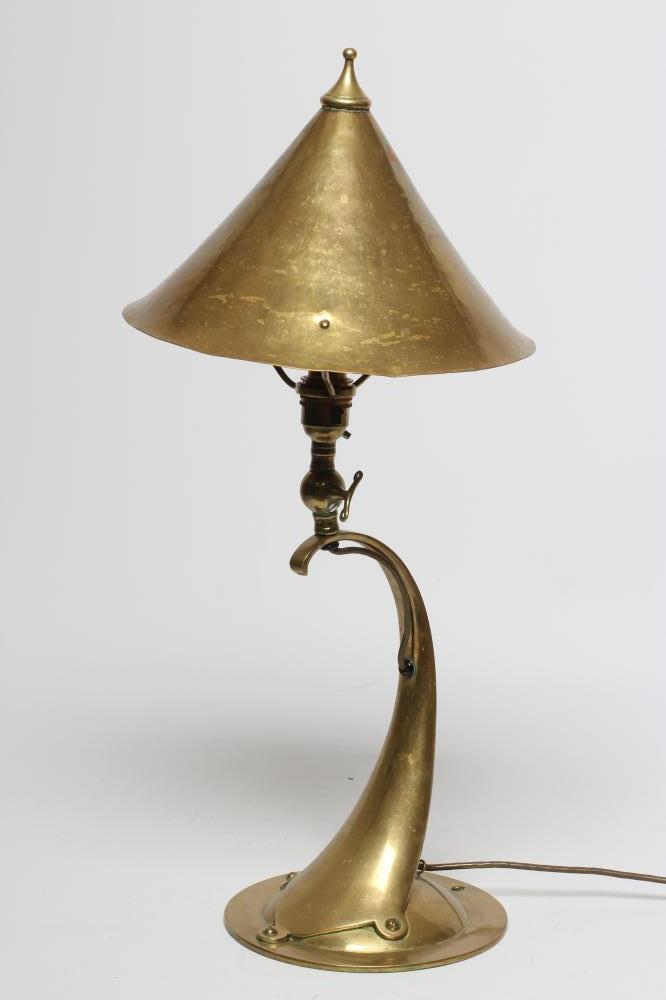 AN ARTS AND CRAFTS STYLE BRASS TABLE LAMP Image