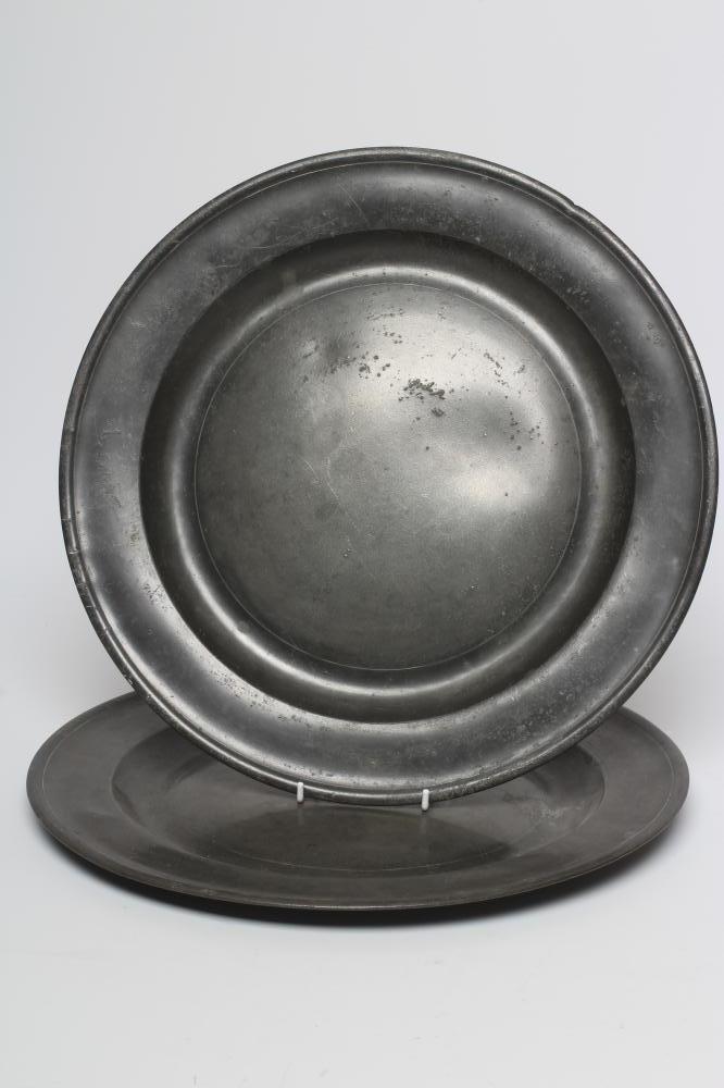 A PAIR OF SINGLE REED PEWTER CHARGERS Image