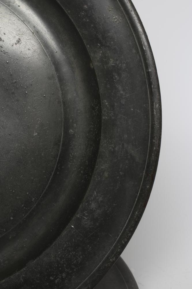 A PAIR OF SINGLE REED PEWTER CHARGERS Image