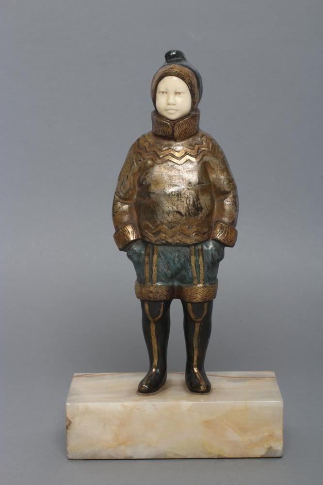 AFTER H. MABEL WHITE (1870-1948) an Art Deco bronze and ivory figure cast as a young Eskimo boy Image