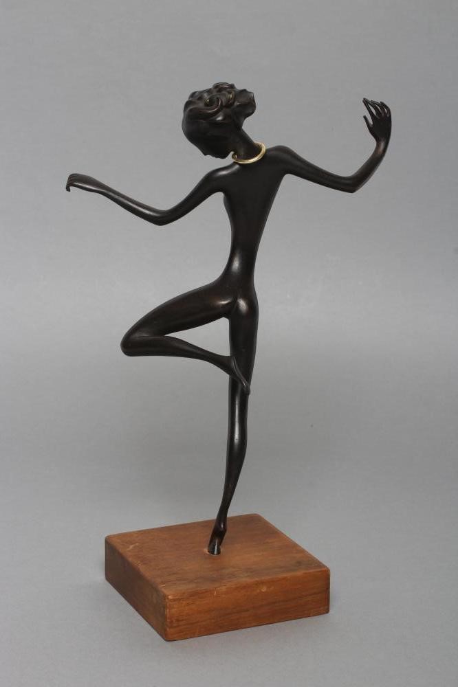 A HAGENAUER(?) BRONZE FIGURE OF A YOUNG AFRICAN FEMALE DANCER with gilded neck ring Image