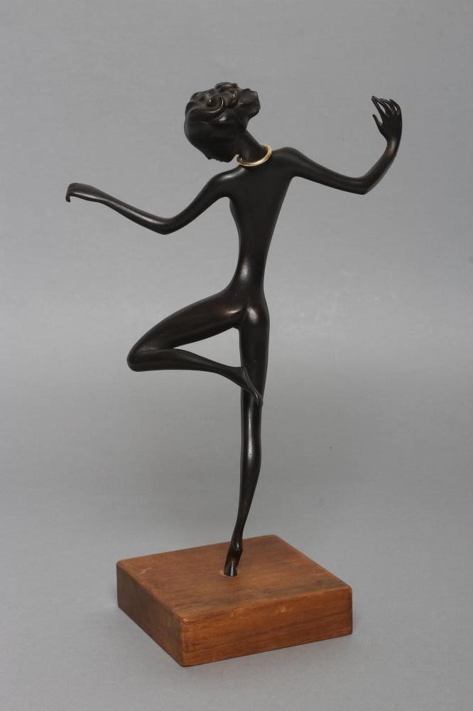 A HAGENAUER(?) BRONZE FIGURE OF A YOUNG AFRICAN FEMALE DANCER with gilded neck ring Image