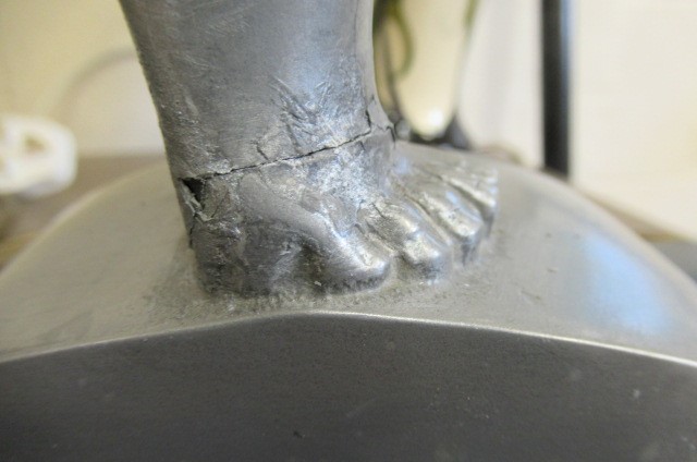 AFTER LORENZL - a large silvered metal figural lamp base modelled as a young female nude standing on Image