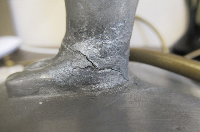 AFTER LORENZL - a large silvered metal figural lamp base modelled as a young female nude standing on Image