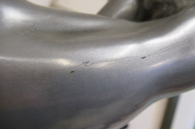 AFTER LORENZL - a large silvered metal figural lamp base modelled as a young female nude standing on Image