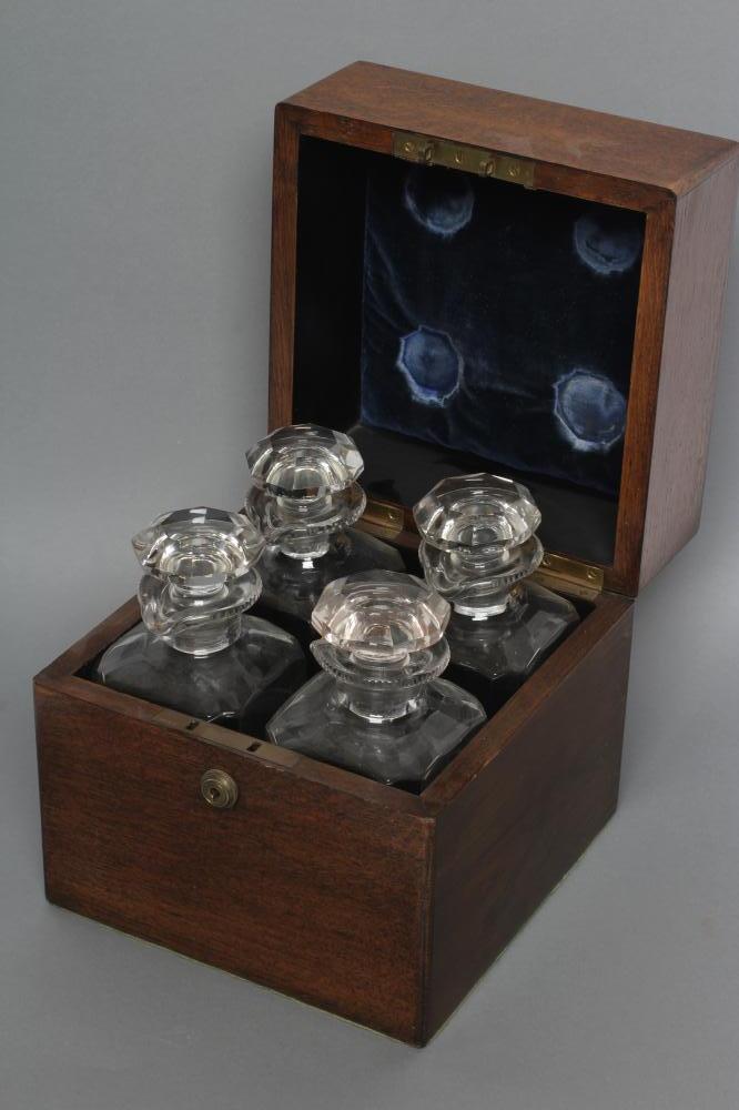 A LATE VICTORIAN OAK FOUR BOTTLE DECANTER BOX of square section with Bramah lock Image