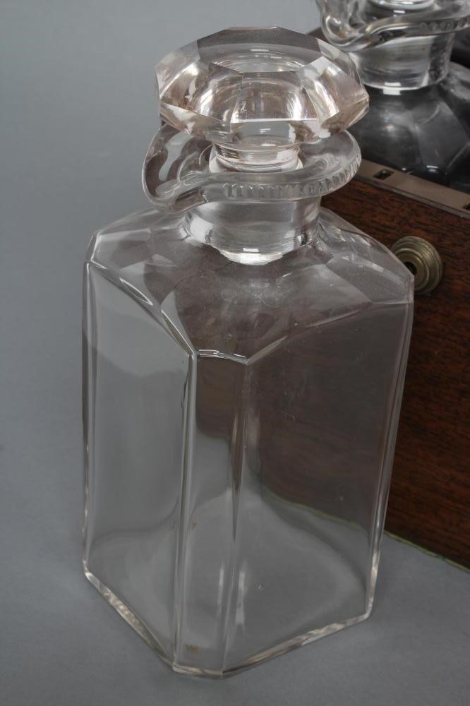 A LATE VICTORIAN OAK FOUR BOTTLE DECANTER BOX of square section with Bramah lock Image