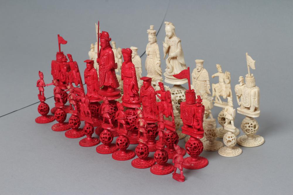 A COMPOSITE CHINESE IVORY PUZZLE BALL CHESS SET Image