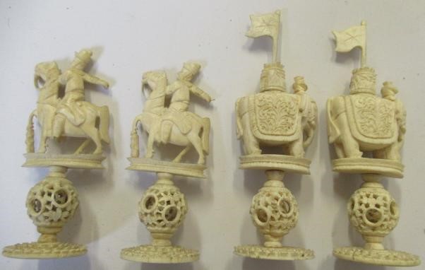 A COMPOSITE CHINESE IVORY PUZZLE BALL CHESS SET Image