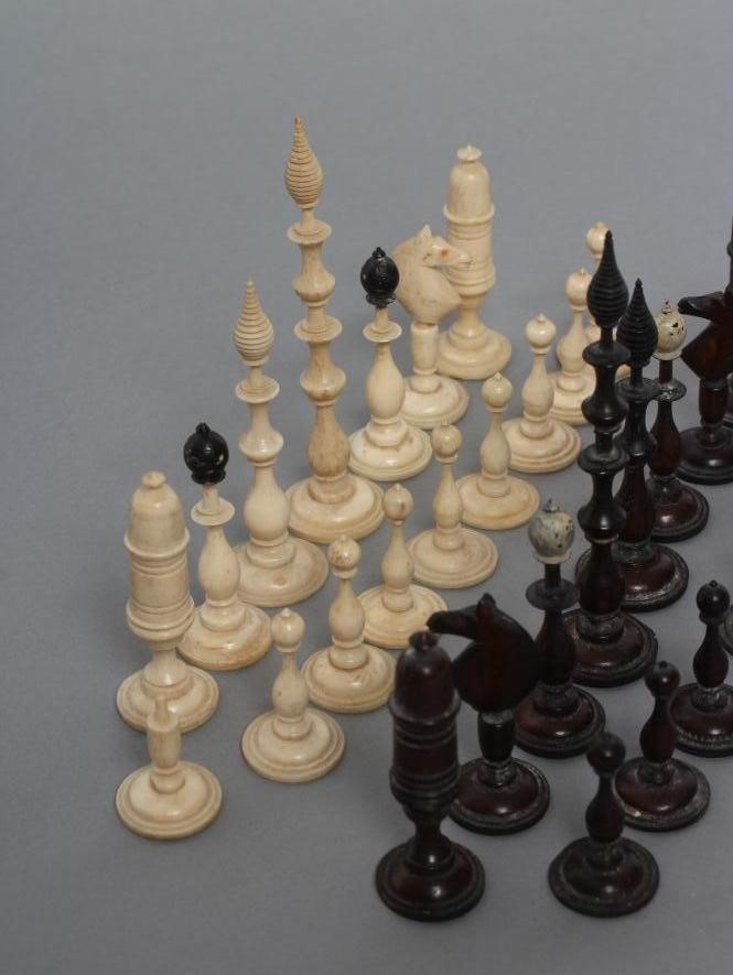 A GERMAN BONE SILENUS CHESS SET Image