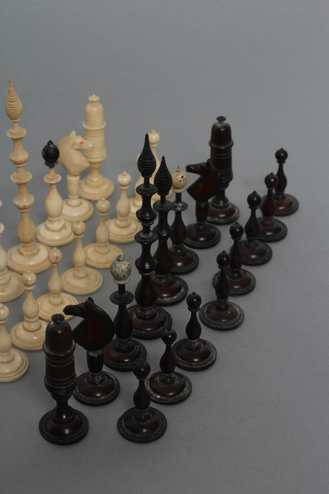 A GERMAN BONE SILENUS CHESS SET Image