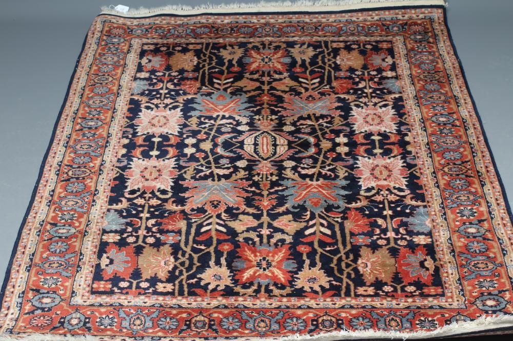 A PERSIAN WOOL RUG Image