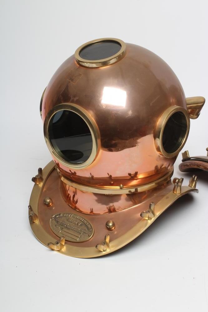 A BRASS MOUNTED COPPER DIVING HELMET Image
