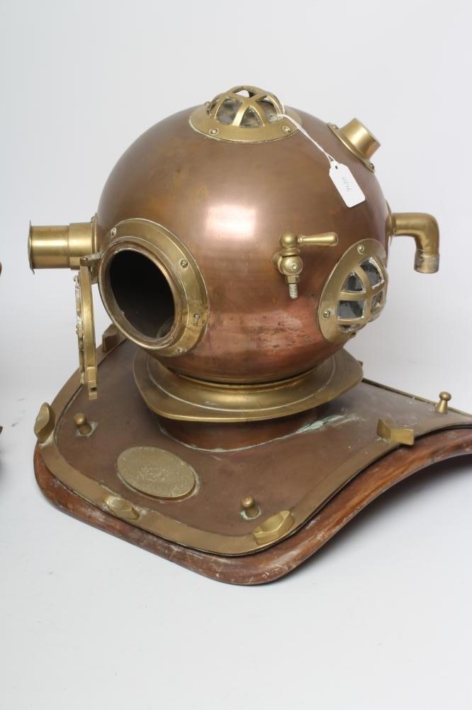 A BRASS MOUNTED COPPER DIVING HELMET Image