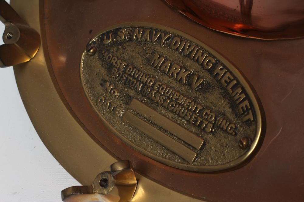 A BRASS MOUNTED COPPER DIVING HELMET Image