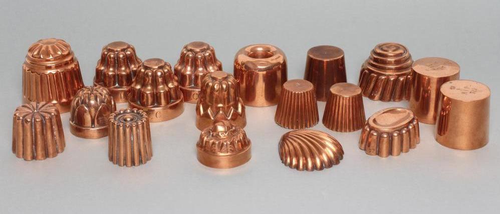 FIFTEEN SMALL VICTORIAN COPPER JELLY MOULDS including a shell Image