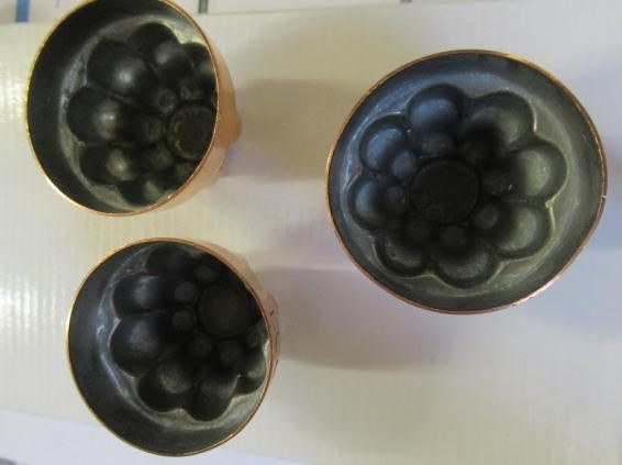 FIFTEEN SMALL VICTORIAN COPPER JELLY MOULDS including a shell Image