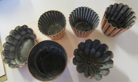 FIFTEEN SMALL VICTORIAN COPPER JELLY MOULDS including a shell Image