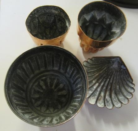 FIFTEEN SMALL VICTORIAN COPPER JELLY MOULDS including a shell Image