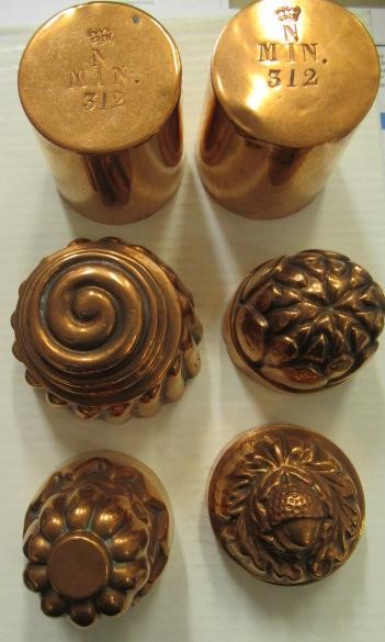 FIFTEEN SMALL VICTORIAN COPPER JELLY MOULDS including a shell Image