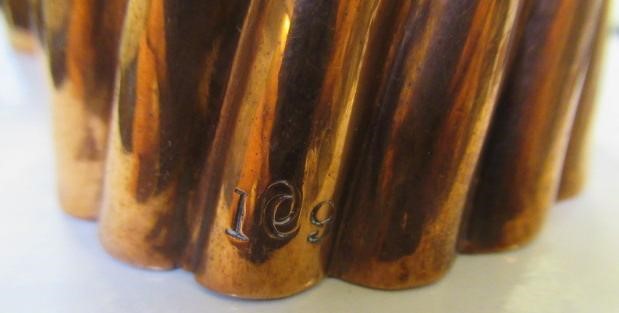 FIFTEEN SMALL VICTORIAN COPPER JELLY MOULDS including a shell Image