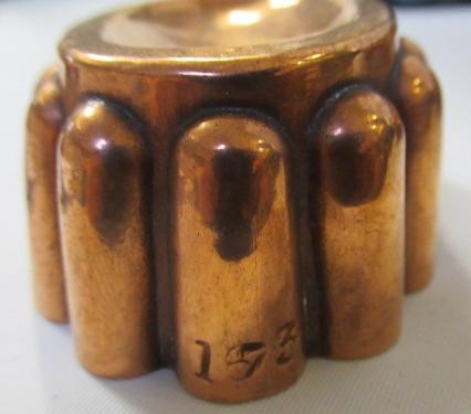 FIFTEEN SMALL VICTORIAN COPPER JELLY MOULDS including a shell Image
