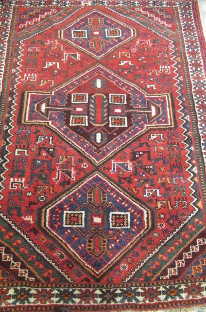 A PERSIAN TRIBAL RUG Image