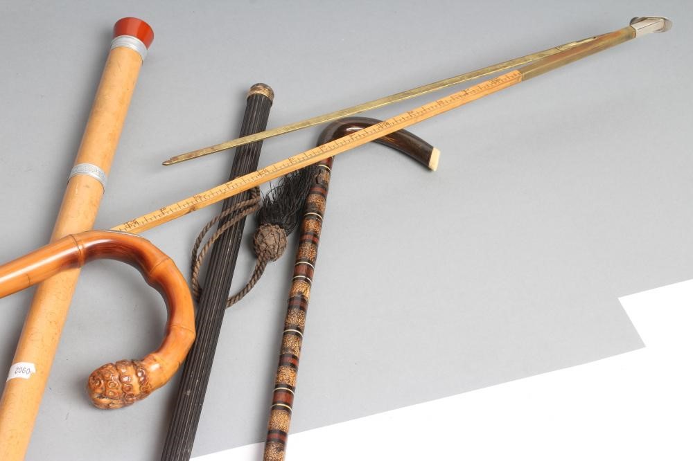 A BAMBOO HORSE MEASURING STICK with silver plated and brass mounts Image