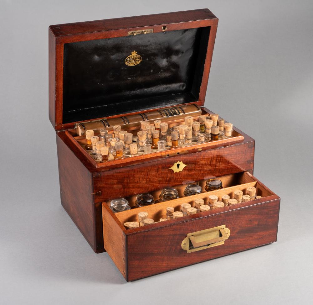 A MAHOGANY DOMESTIC HOMEOPATHIC MEDICINE CHEST by T. Turner & Co. London and Manchester Image