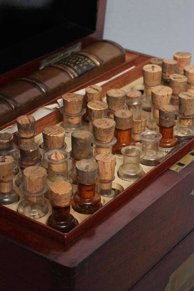 A MAHOGANY DOMESTIC HOMEOPATHIC MEDICINE CHEST by T. Turner & Co. London and Manchester Image