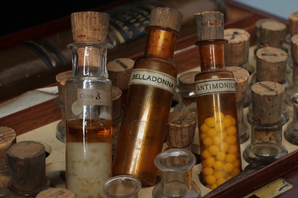 A MAHOGANY DOMESTIC HOMEOPATHIC MEDICINE CHEST by T. Turner & Co. London and Manchester Image