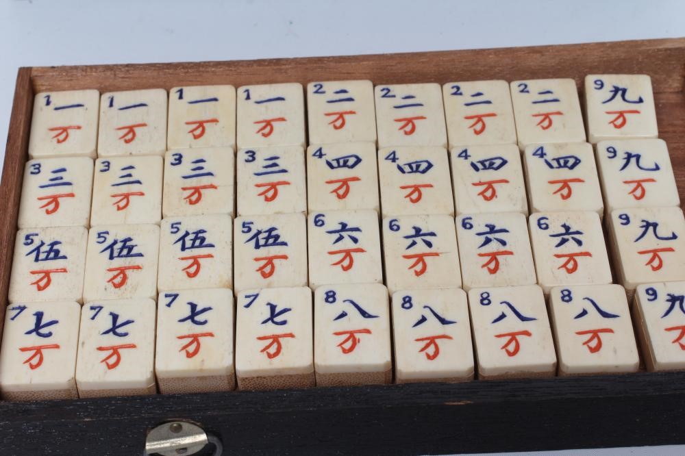 A CHINESE BONE AND BAMBOO MAH-JONG SET Image