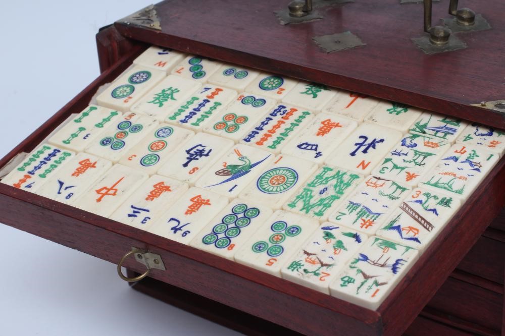 A CHINESE BONE AND BAMBOO MAH-JONG SET Image