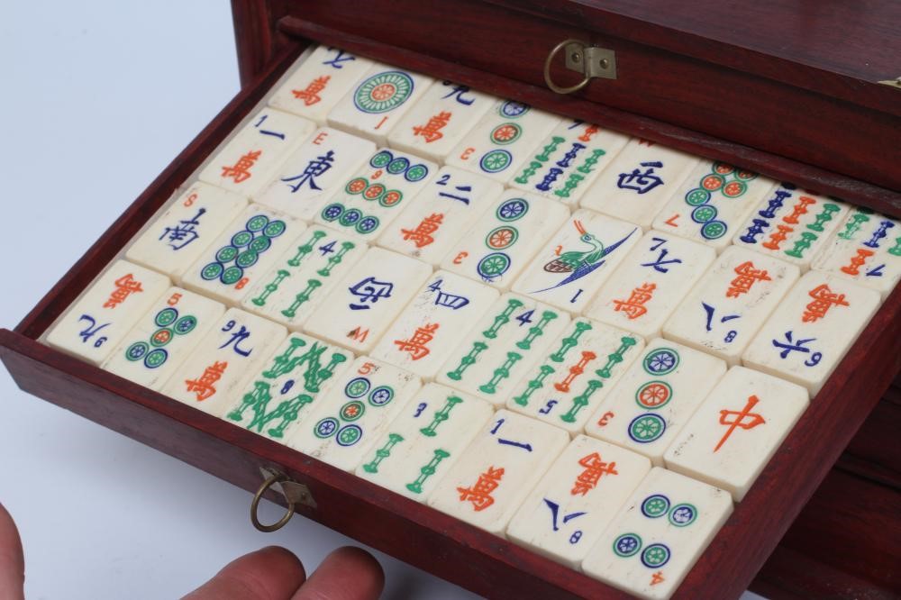 A CHINESE BONE AND BAMBOO MAH-JONG SET Image