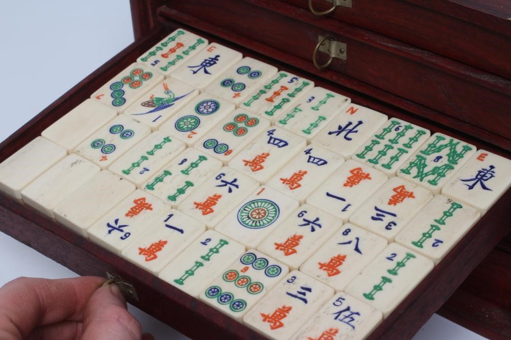 A CHINESE BONE AND BAMBOO MAH-JONG SET Image