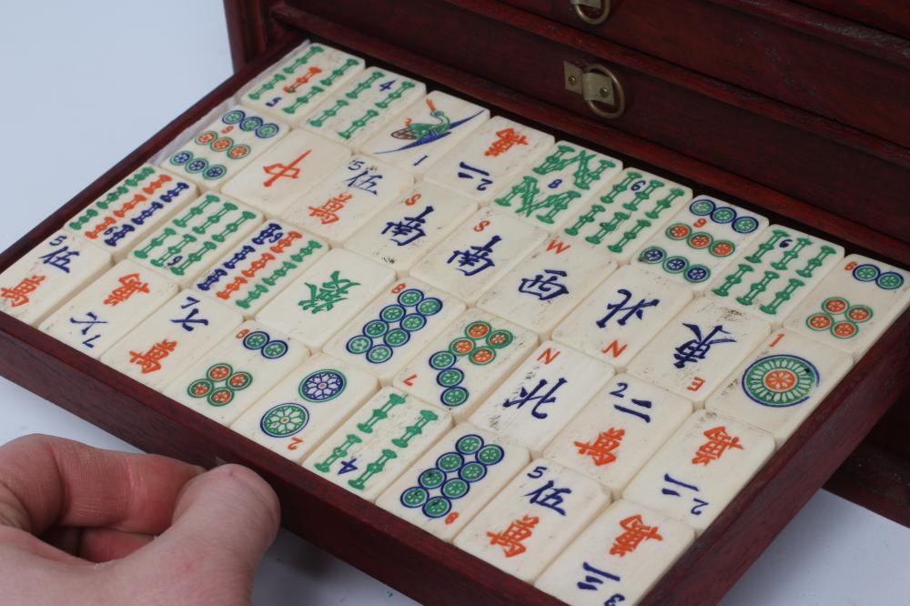 A CHINESE BONE AND BAMBOO MAH-JONG SET Image
