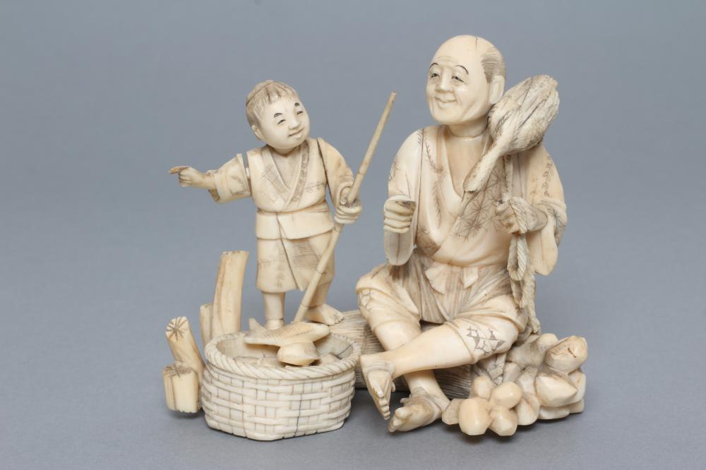 A JAPANESE SECTIONAL IVORY FIGURE Image