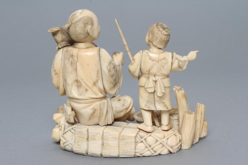 A JAPANESE SECTIONAL IVORY FIGURE Image