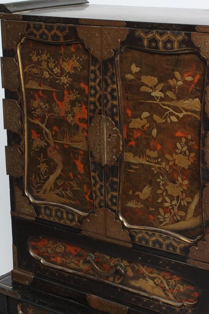 A CHINESE BLACK LACQUERED TABLE CABINET Image