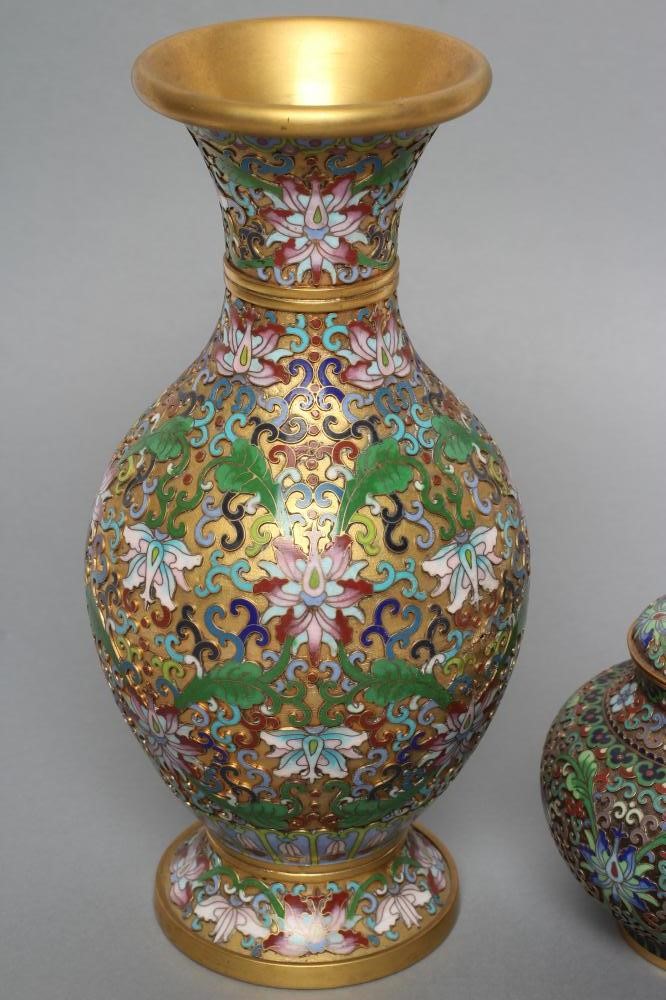 A CHINESE CLOISONNE ENAMEL VASE of ovoid form with waisted neck and flared rim Image