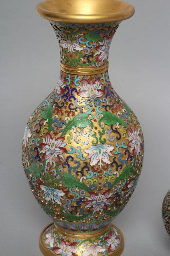 A CHINESE CLOISONNE ENAMEL VASE of ovoid form with waisted neck and flared rim Image
