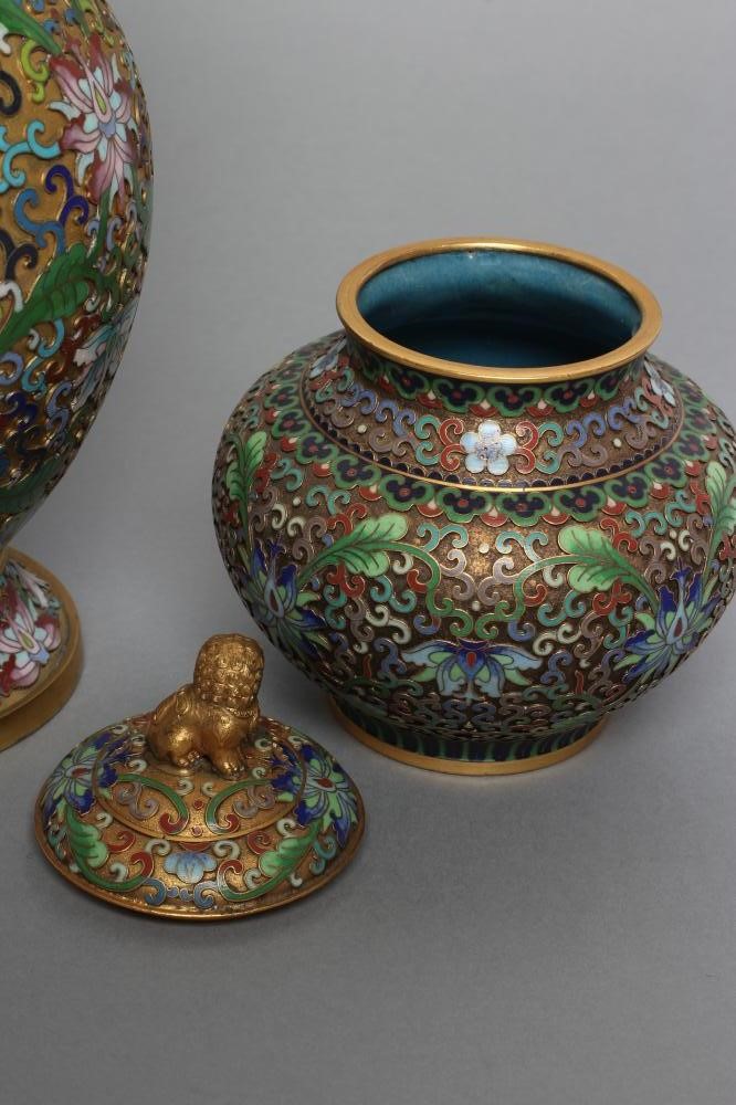 A CHINESE CLOISONNE ENAMEL VASE of ovoid form with waisted neck and flared rim Image