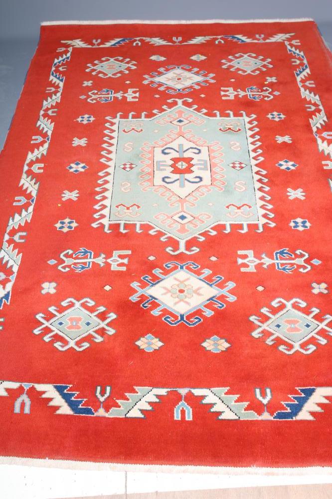 A TURKISH WOOL RUG Image
